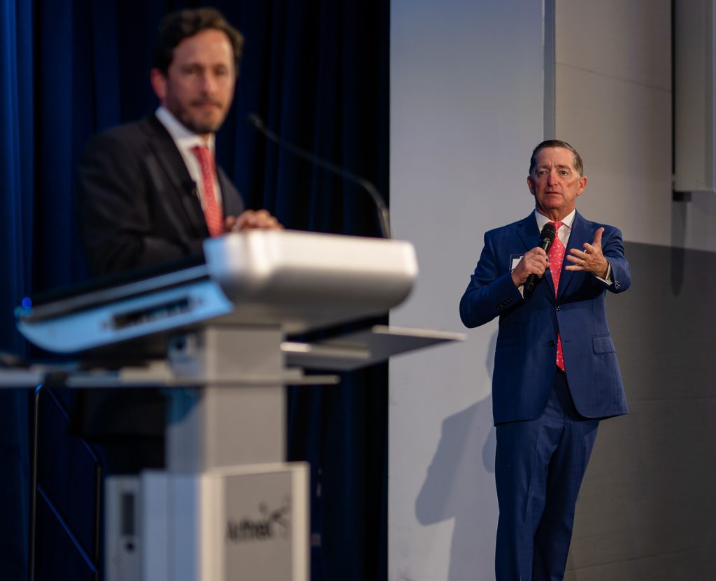 NCH Dr Cubeddu Paul Hiltz on stage giving a speech