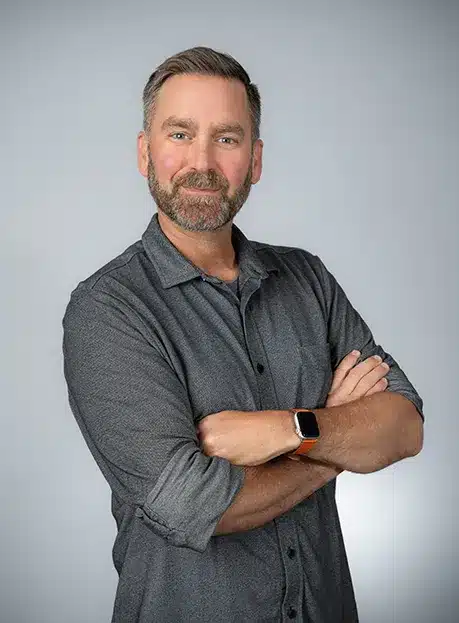 a man with a beard and mustache wearing a watch greg grantham