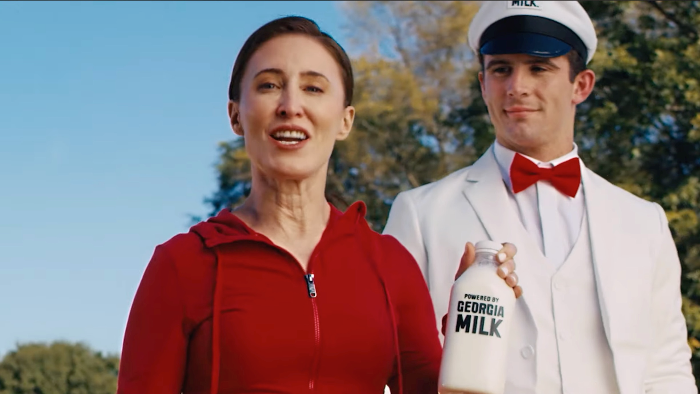 powered by georgia milk stetson bennett campaign woman holding milk with stetson looking on