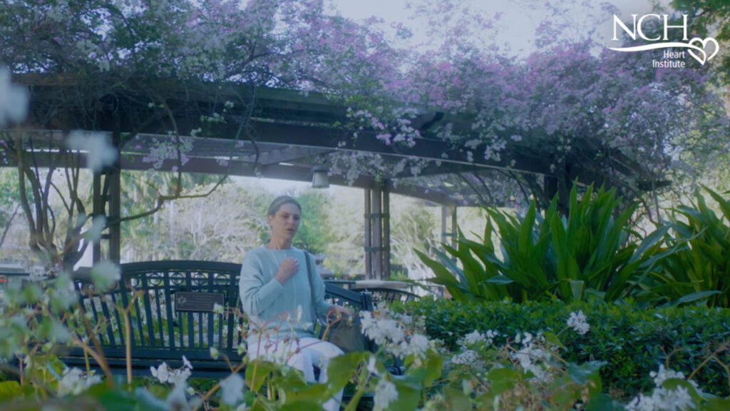 NCH NHI Phase3 Campaign woman in a garden sitting on a bench